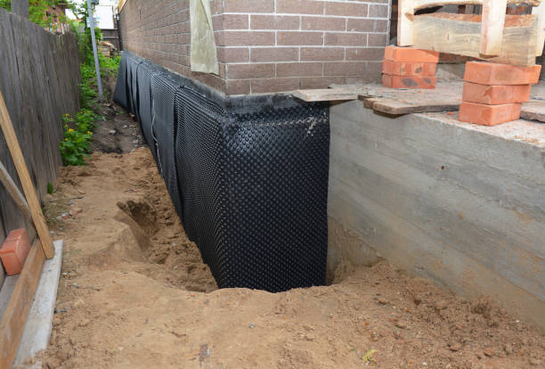 SJ Waterproofing Pros technician performing targeted Foundation Crack Repair assessment in Spencer, TN